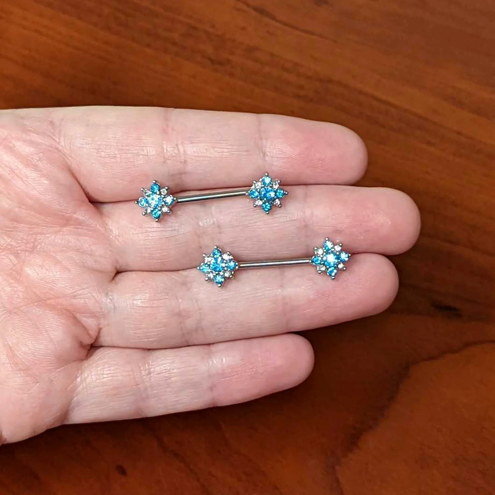 14 Gauge 9/16 Clear Blue Gem Opulent Flower Barbell Nipple Ring Set