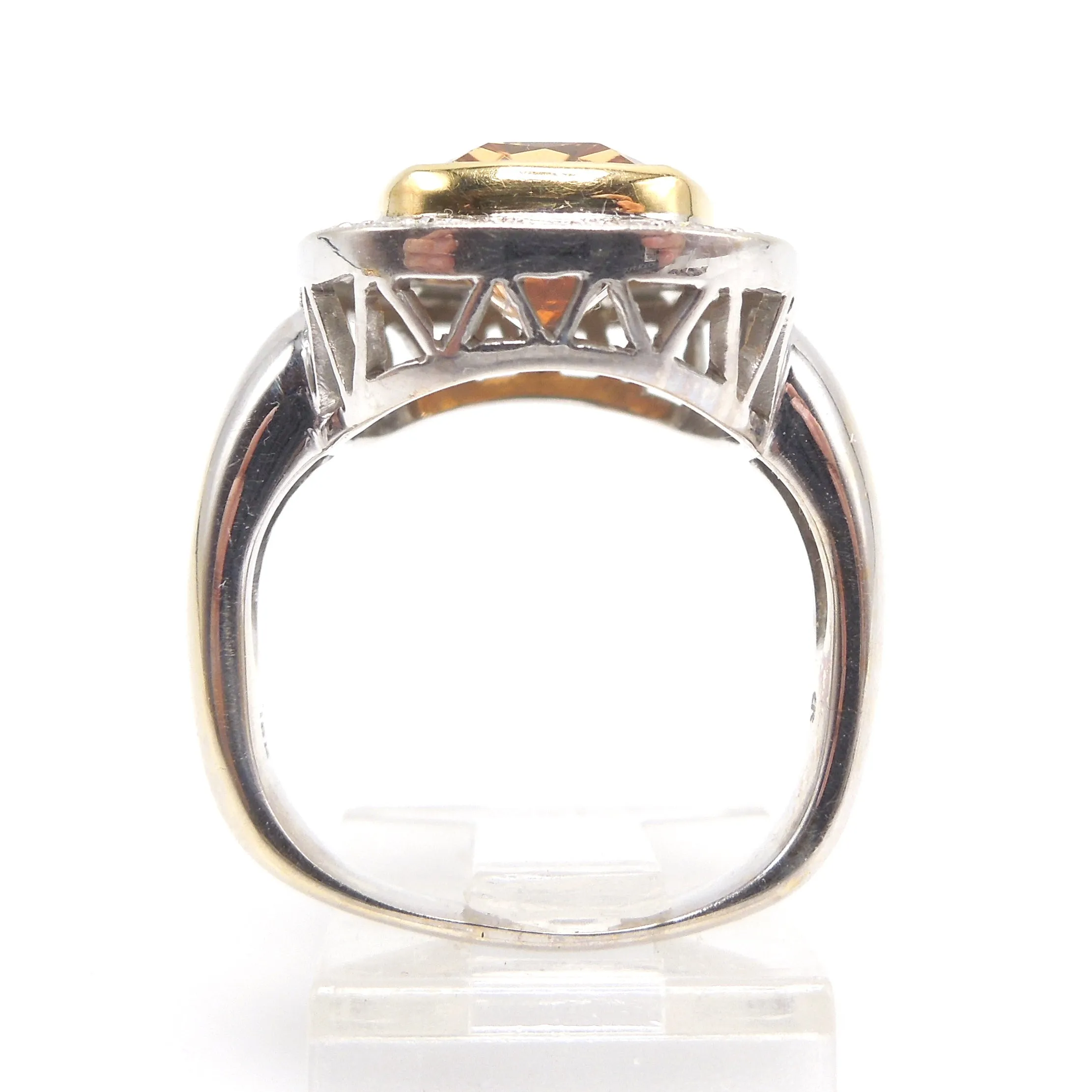 Approximately 6.00 Carat Precious Topaz Ring with Diamond Halo in 18K