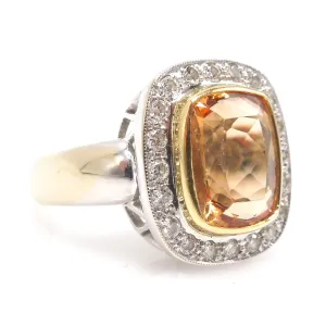 Approximately 6.00 Carat Precious Topaz Ring with Diamond Halo in 18K