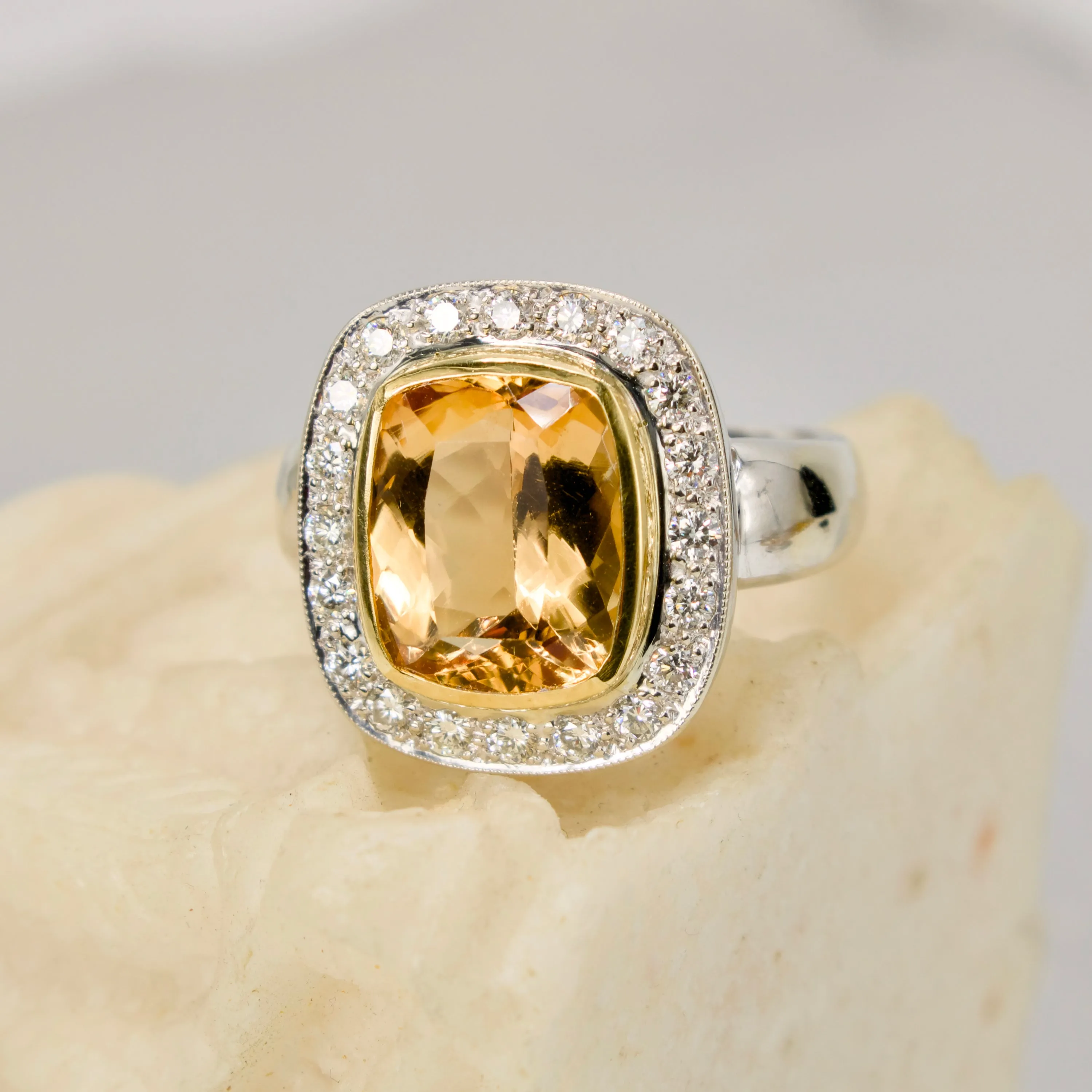 Approximately 6.00 Carat Precious Topaz Ring with Diamond Halo in 18K