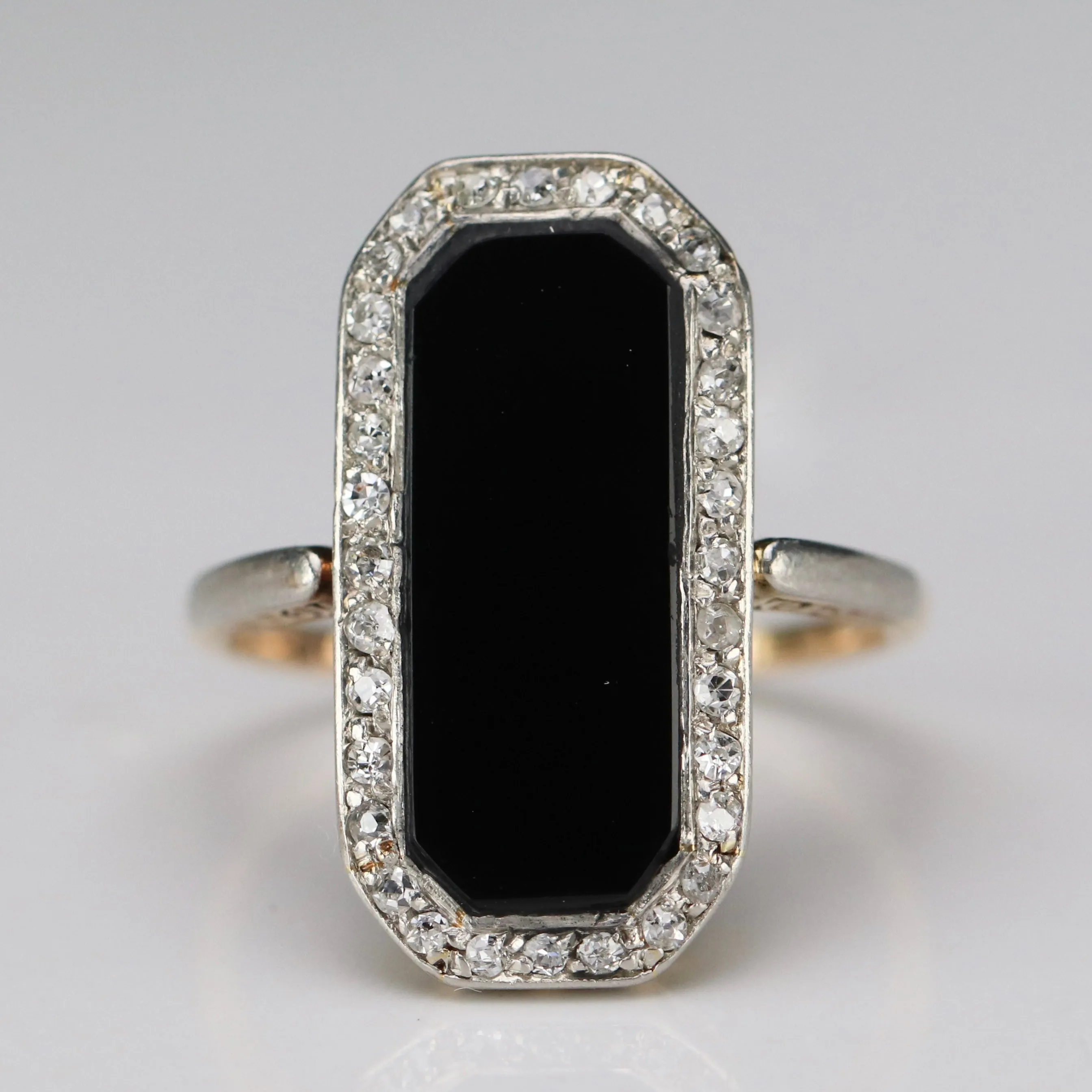 Edwardian Onyx and diamond ring in platinum and 14k yellow gold
