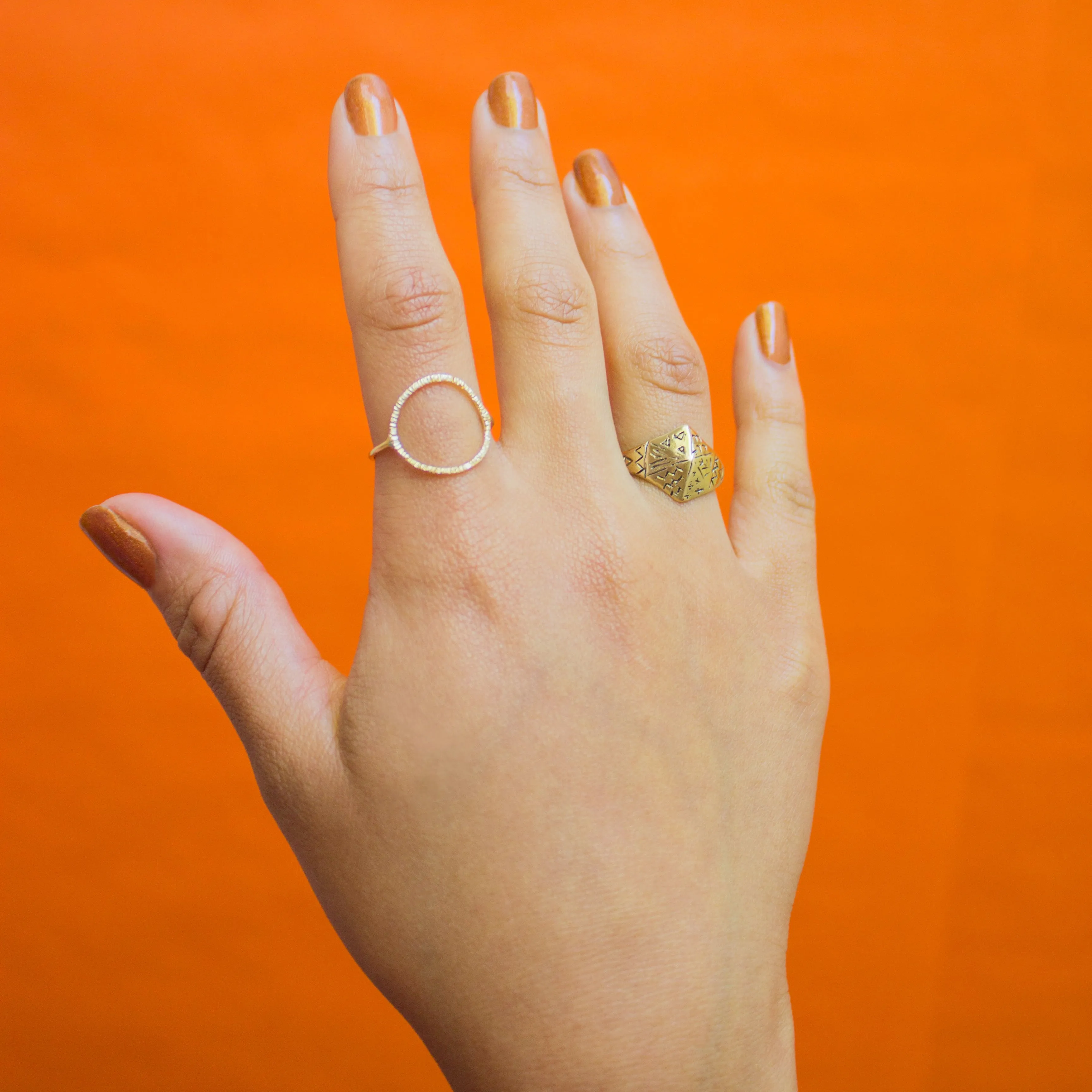 En Ring in Golden Brass