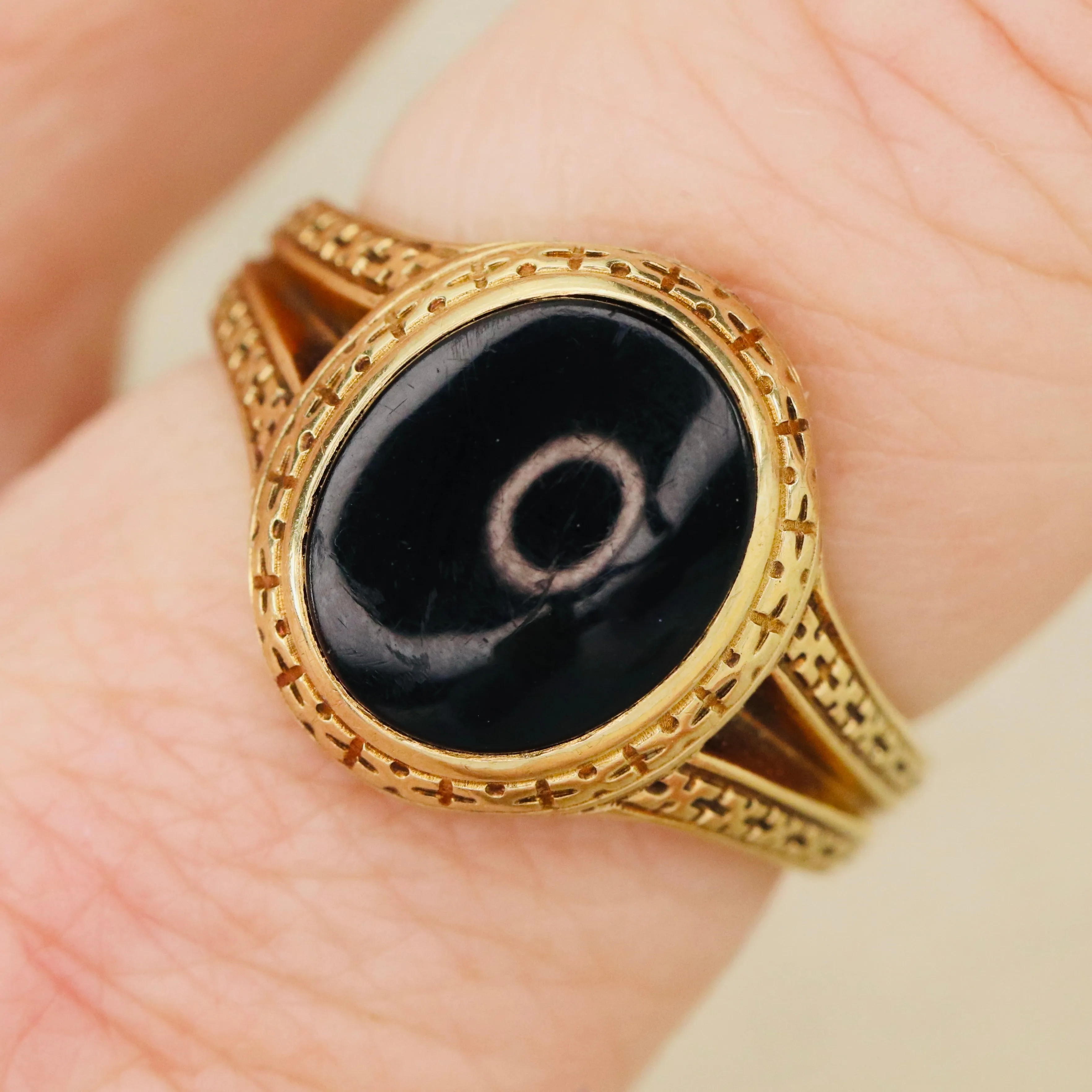 Heavy vintage onyx ring in yellow gold