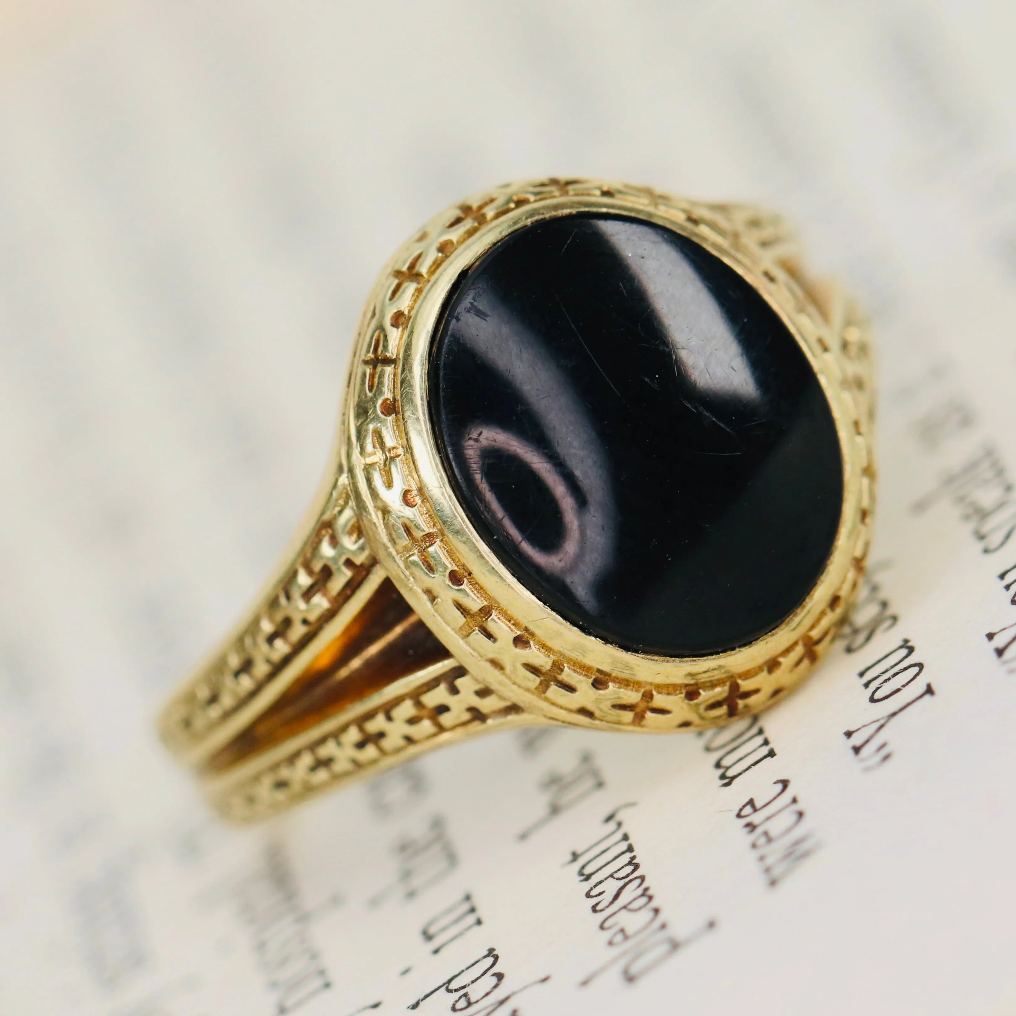Heavy vintage onyx ring in yellow gold