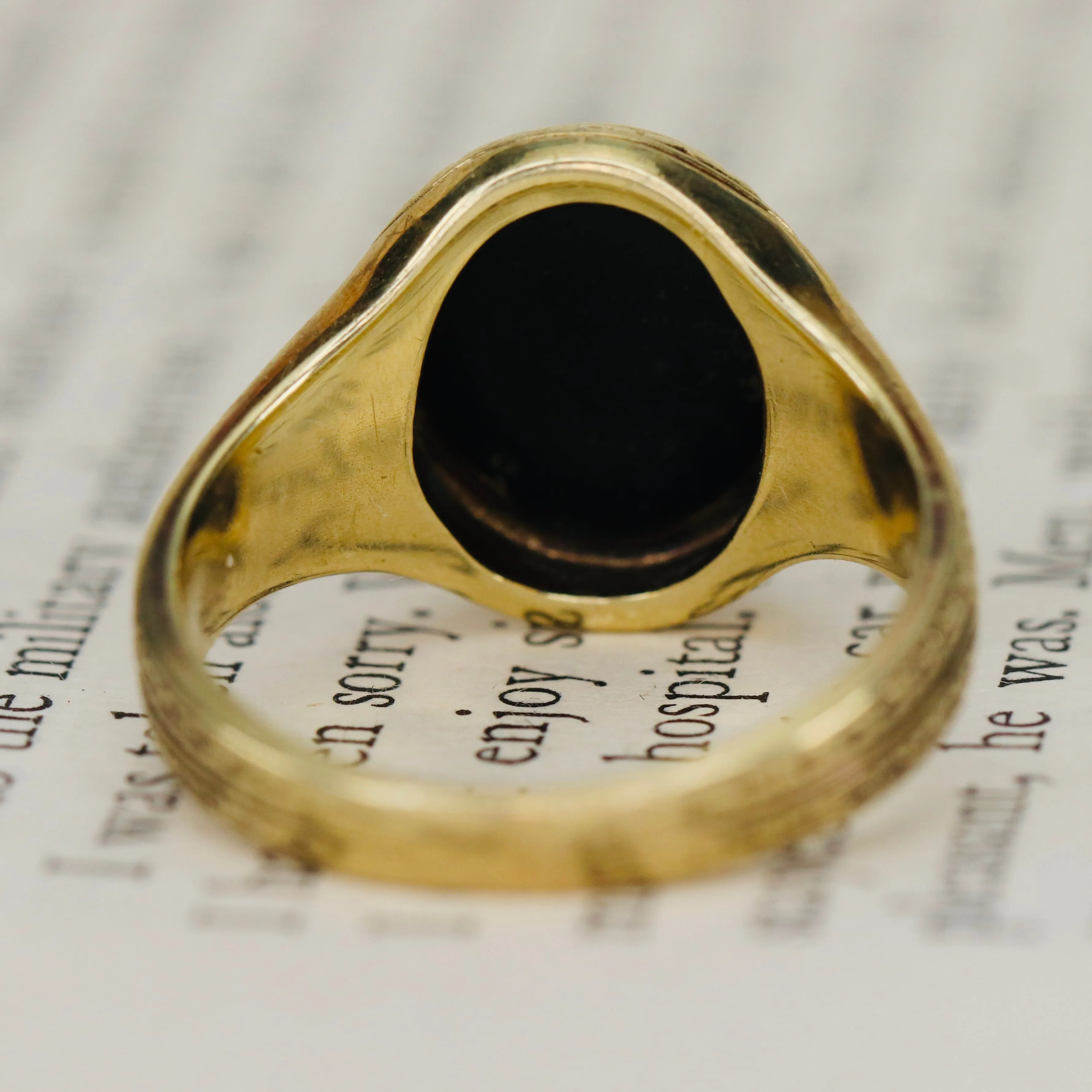 Heavy vintage onyx ring in yellow gold