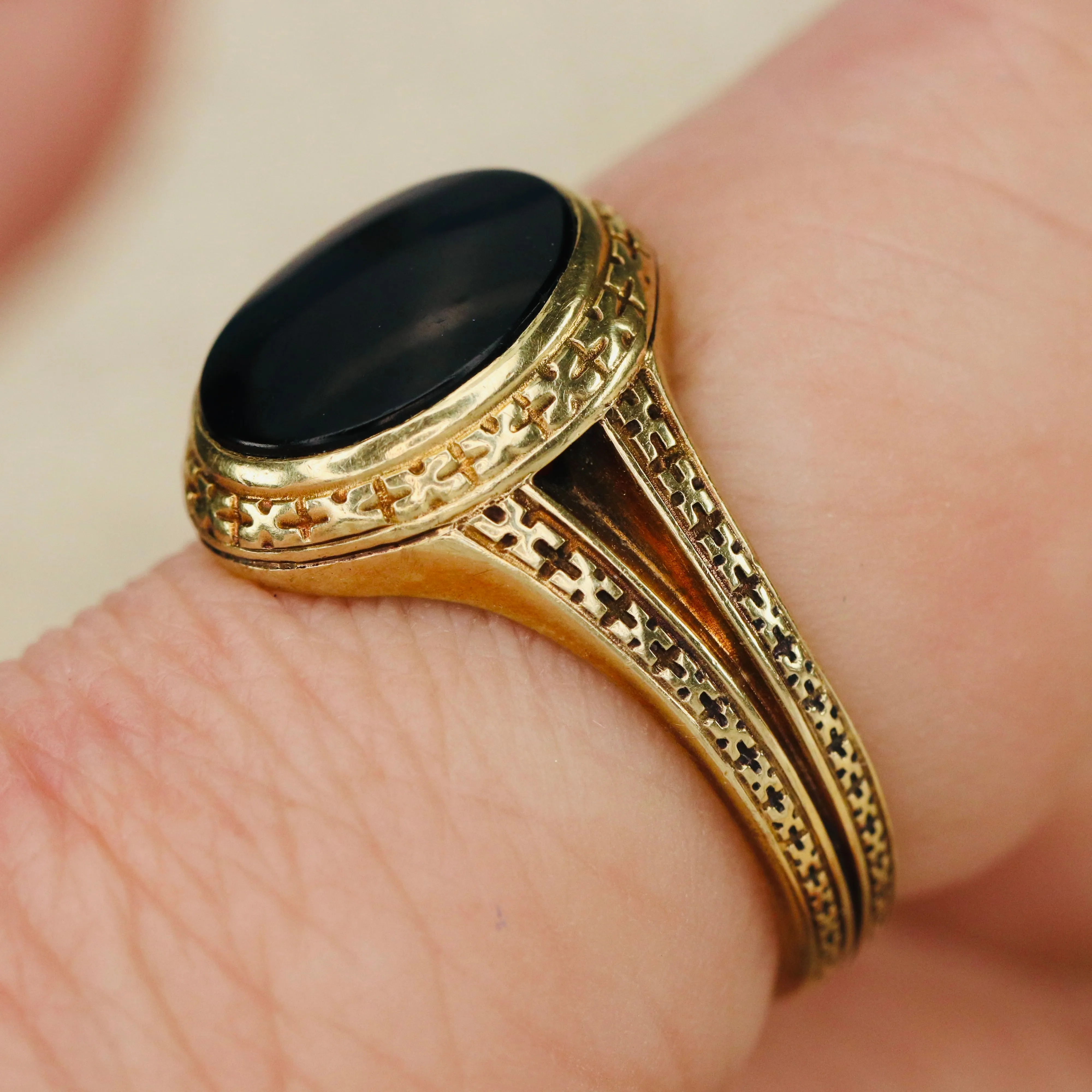 Heavy vintage onyx ring in yellow gold