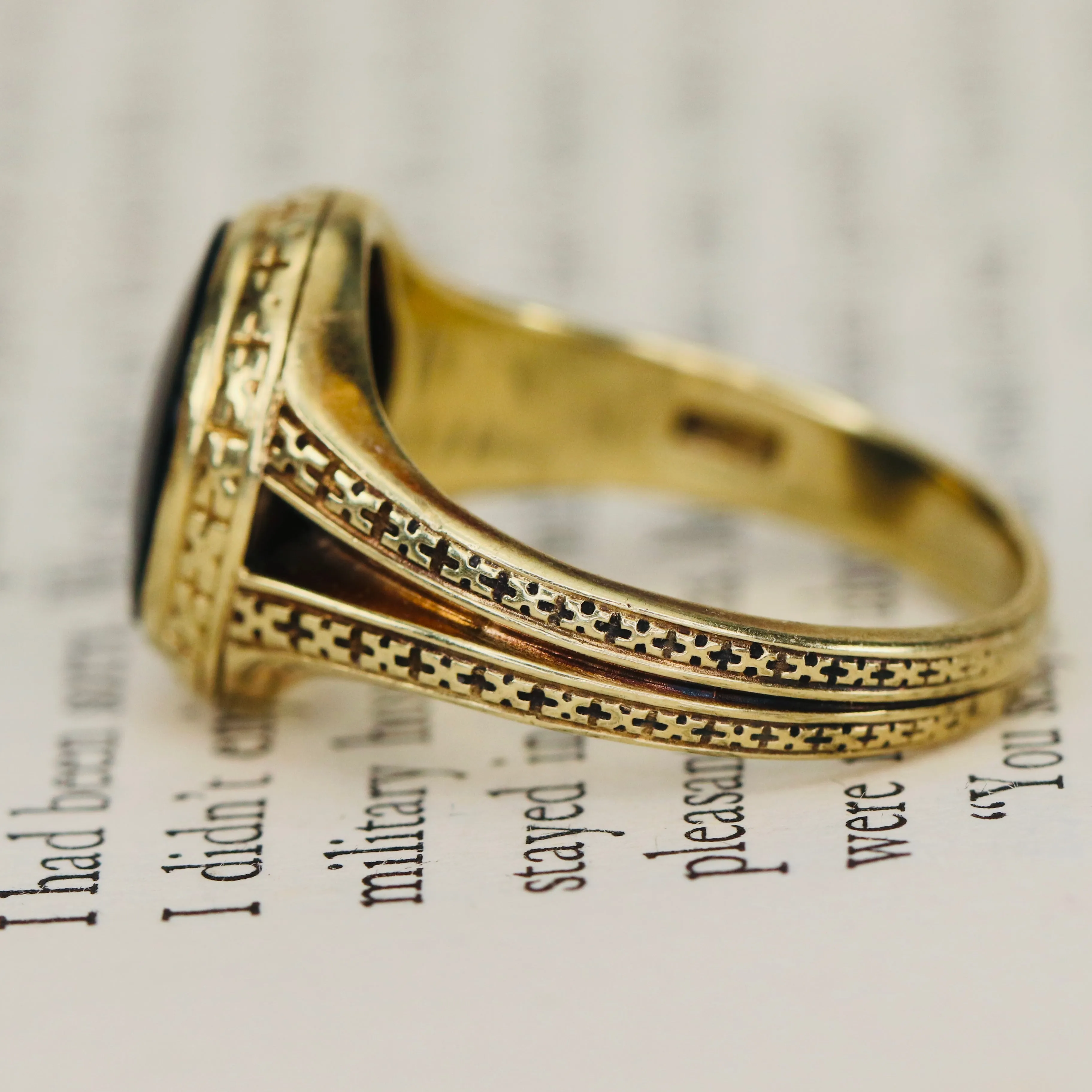 Heavy vintage onyx ring in yellow gold