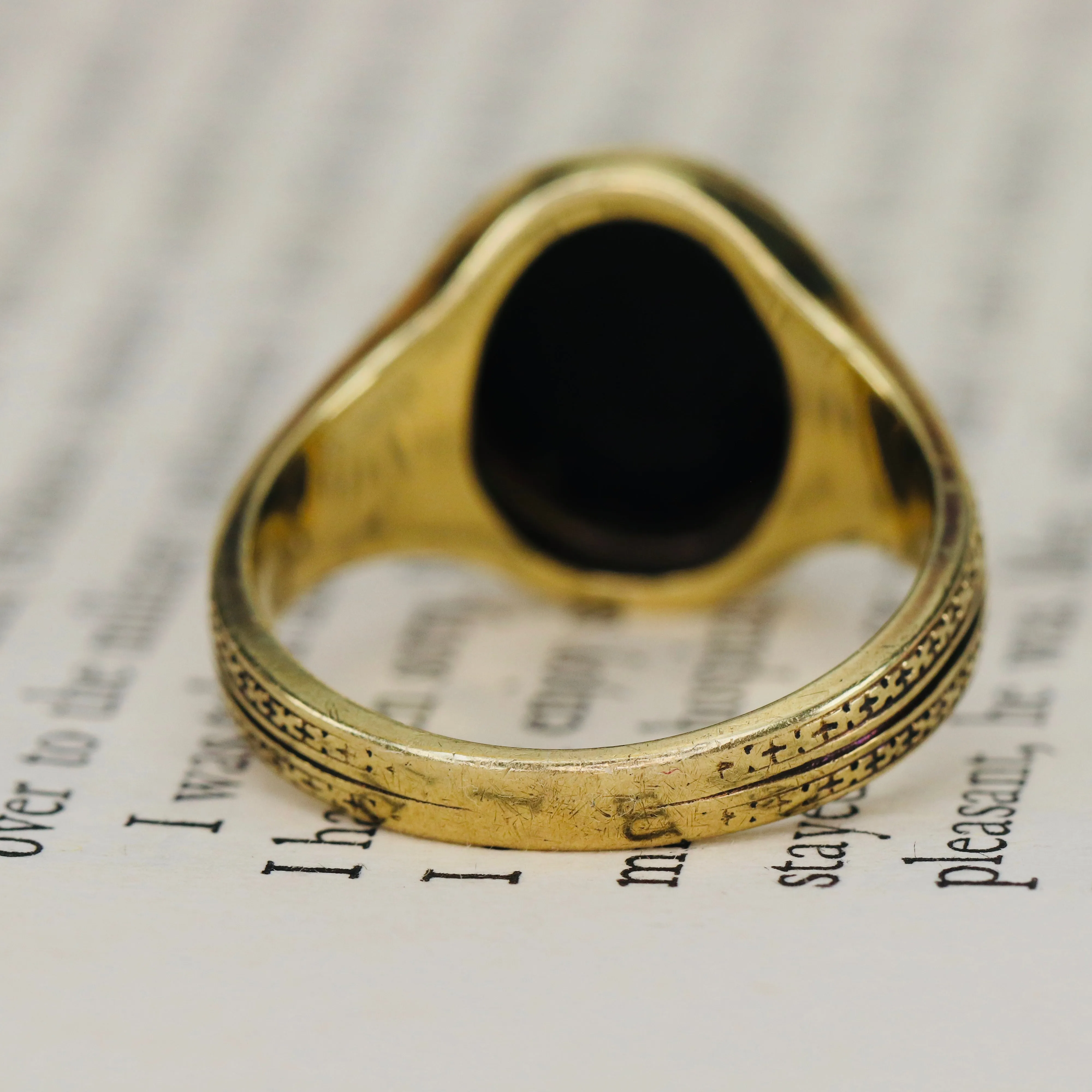 Heavy vintage onyx ring in yellow gold