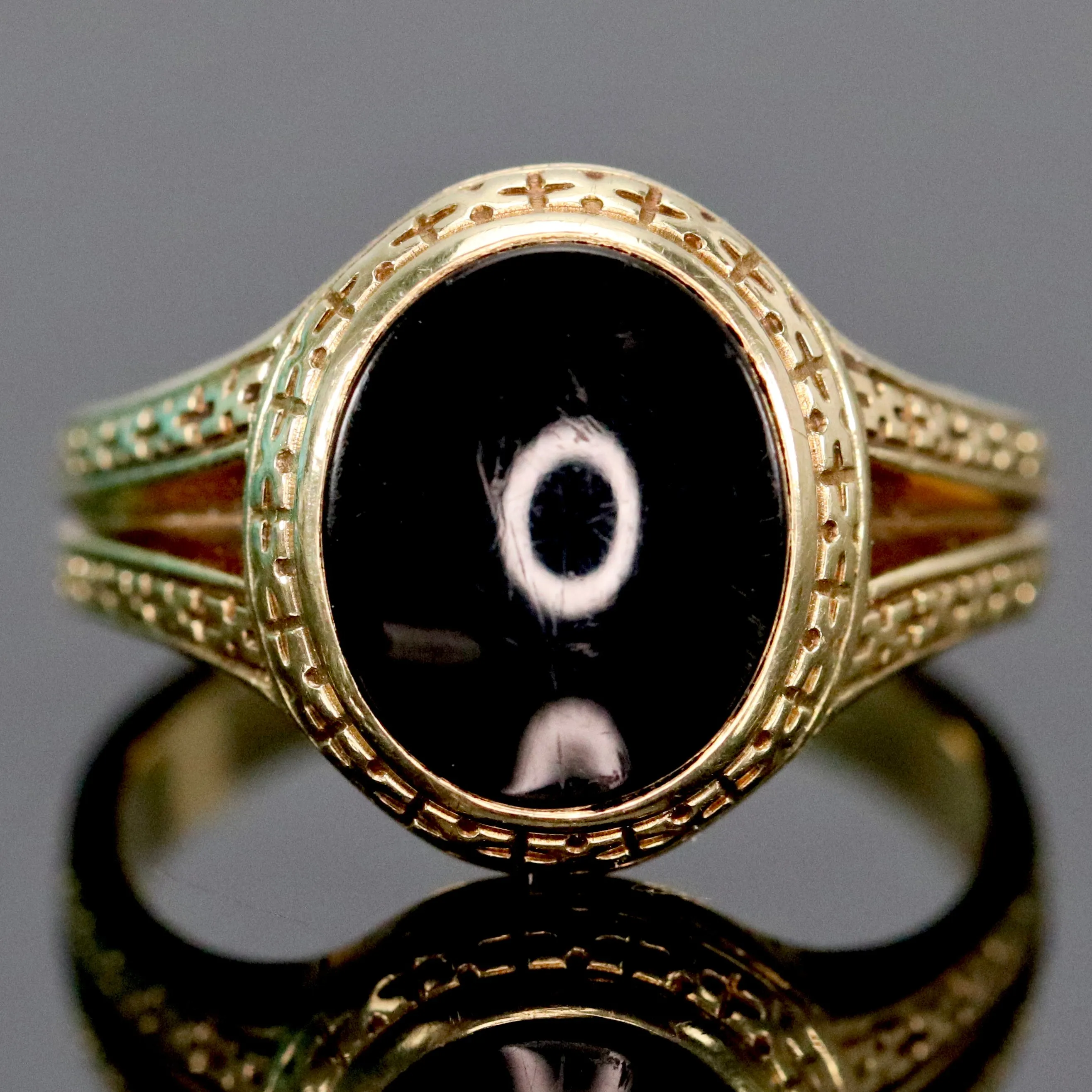 Heavy vintage onyx ring in yellow gold