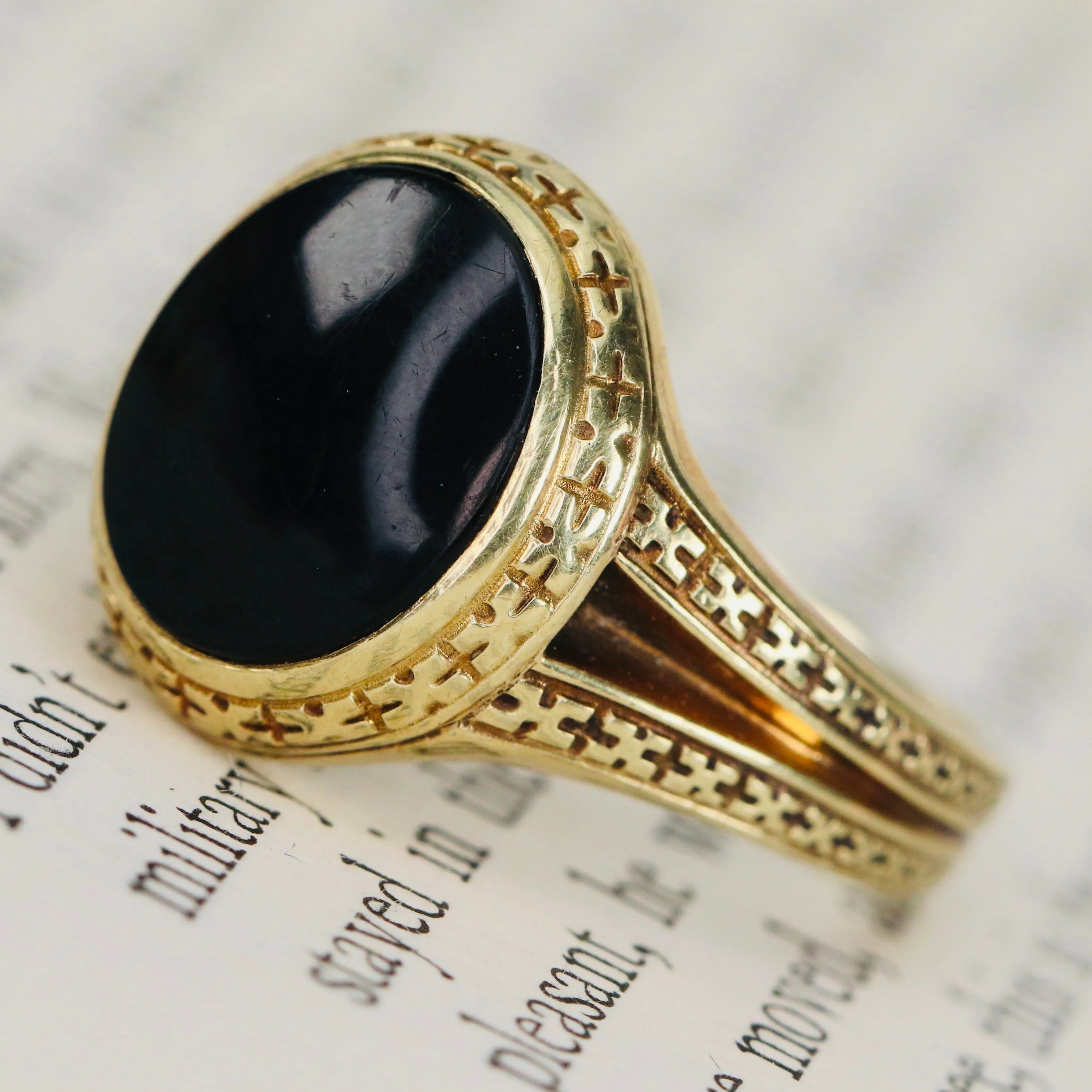 Heavy vintage onyx ring in yellow gold