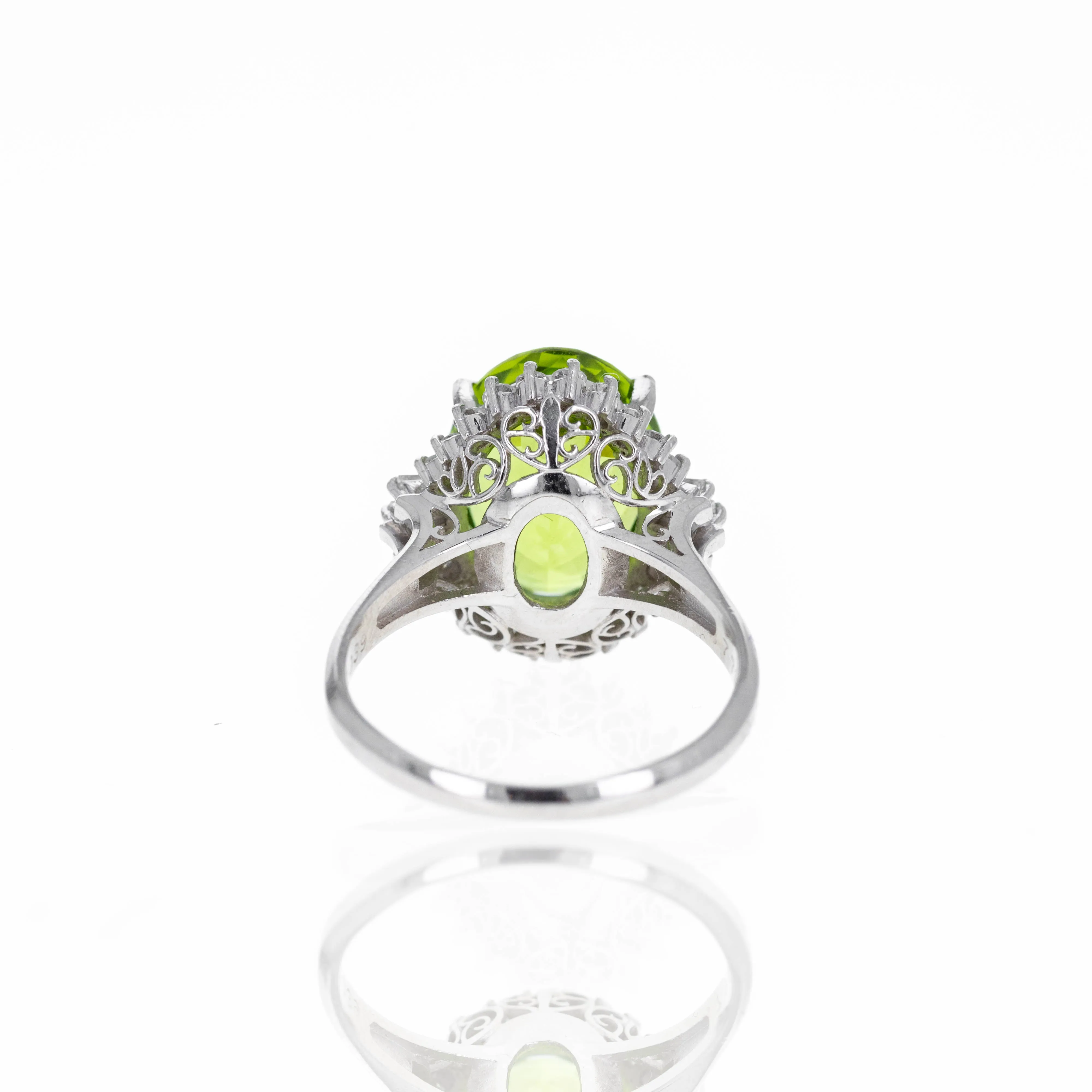 Platinum 7.78 Carat Peridot Diamond Halo Ring