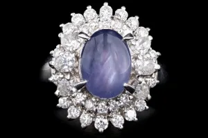 Retro Platinum 2.63 Carat Oval Cabochon Cut Natural Star Sapphire & Diamond Ballerina Ring