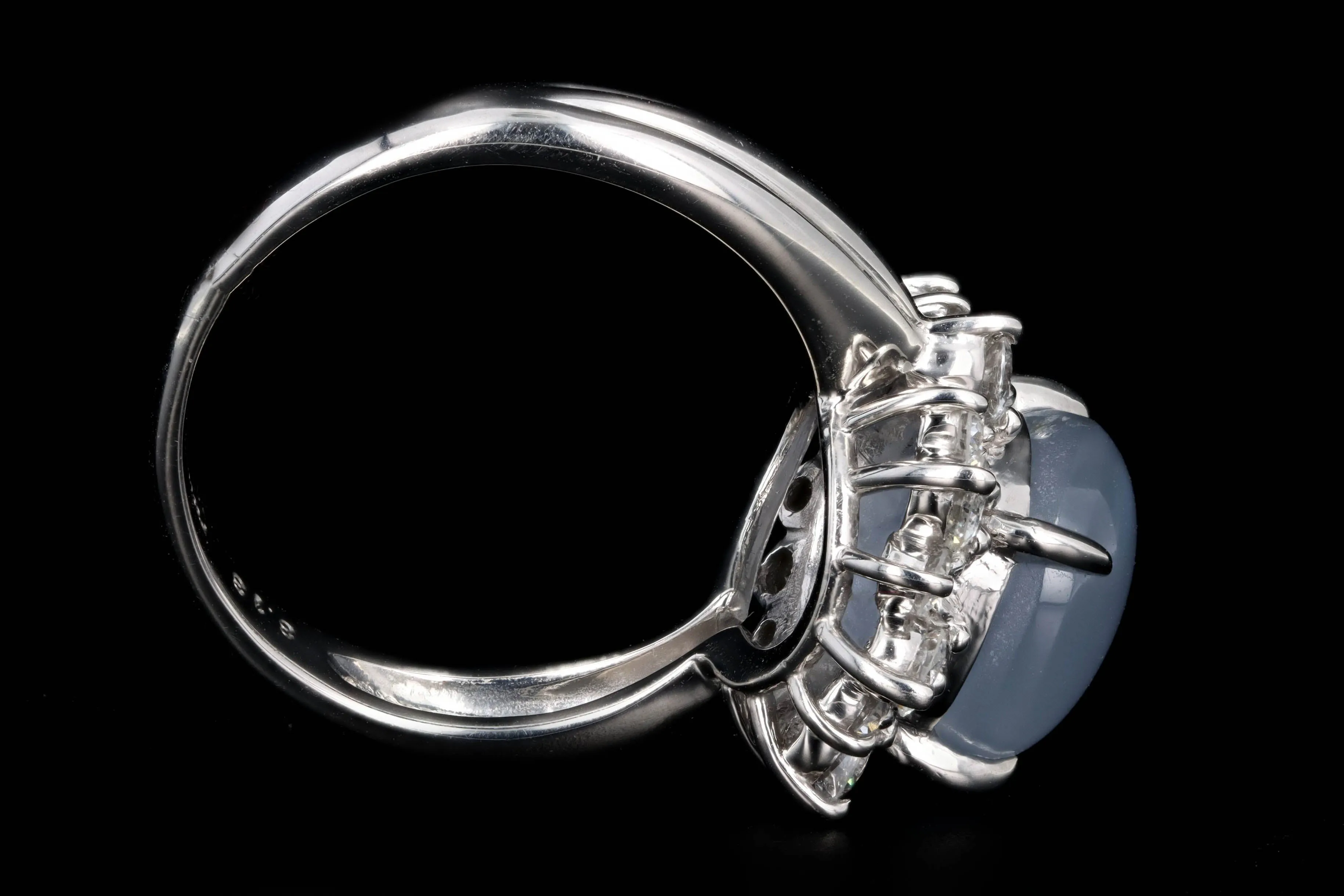 Retro Platinum 8.13 Carat Natural Star Sapphire & Diamond Halo Ring