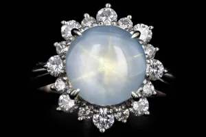 Retro Platinum 8.13 Carat Natural Star Sapphire & Diamond Halo Ring