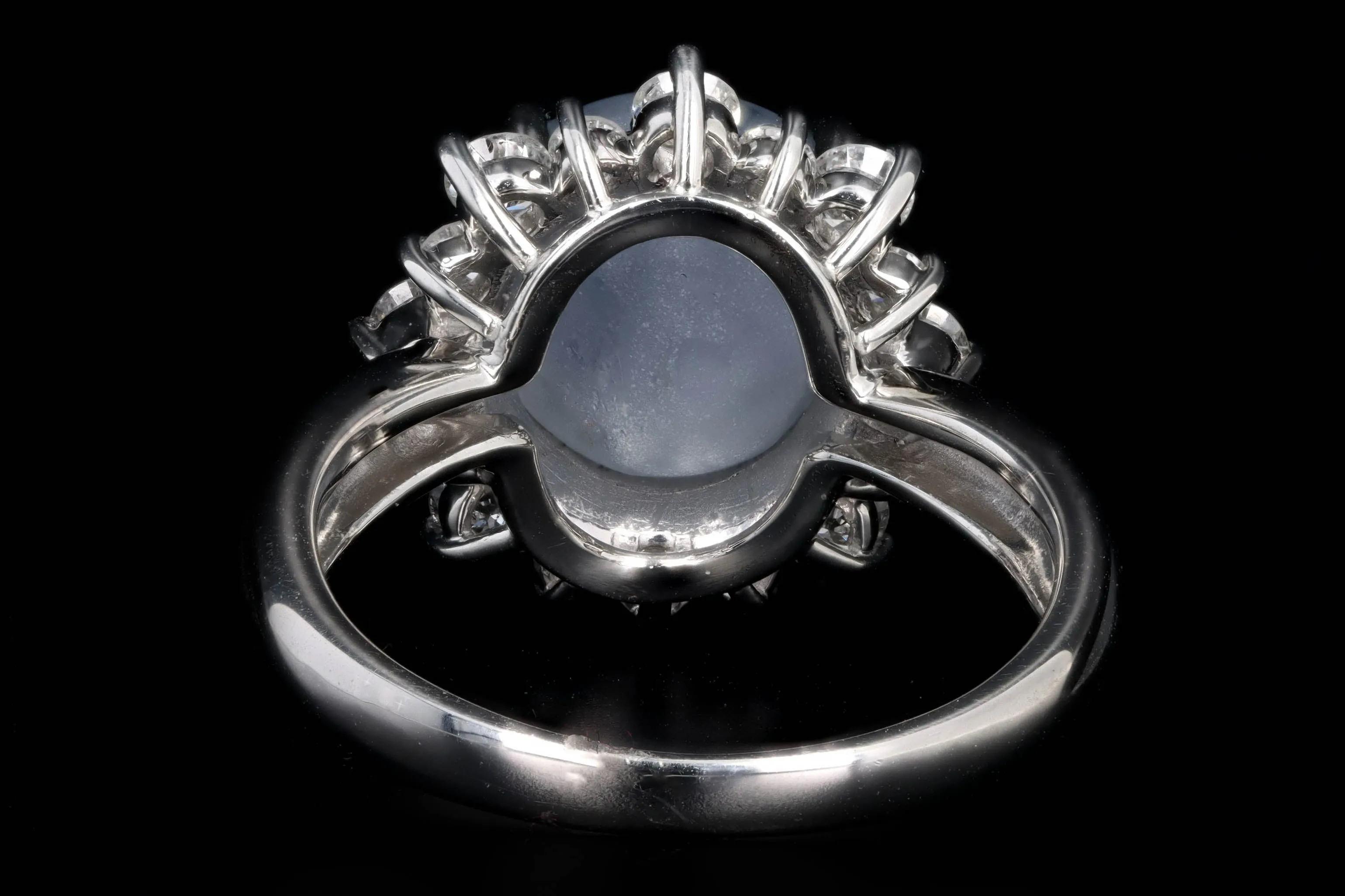 Retro Platinum 8.13 Carat Natural Star Sapphire & Diamond Halo Ring