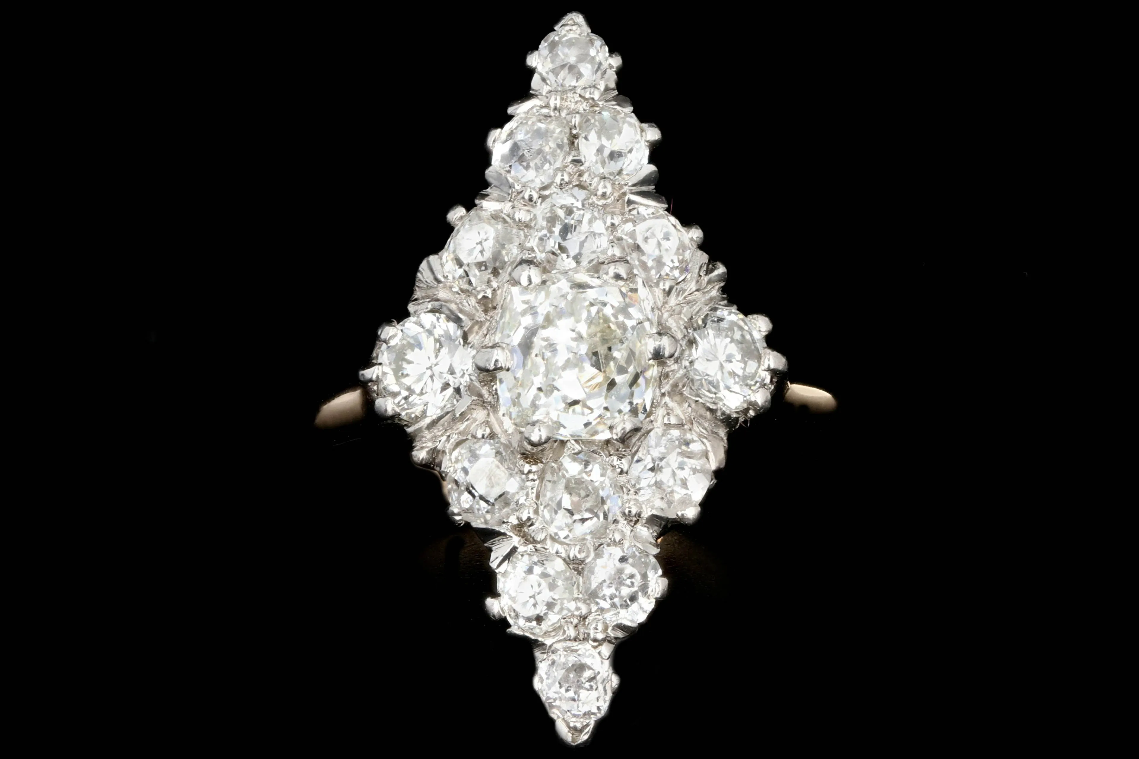 Victorian Platinum and 14K Yellow Gold .60 Carat Old Mine Cut Diamond Navette Ring