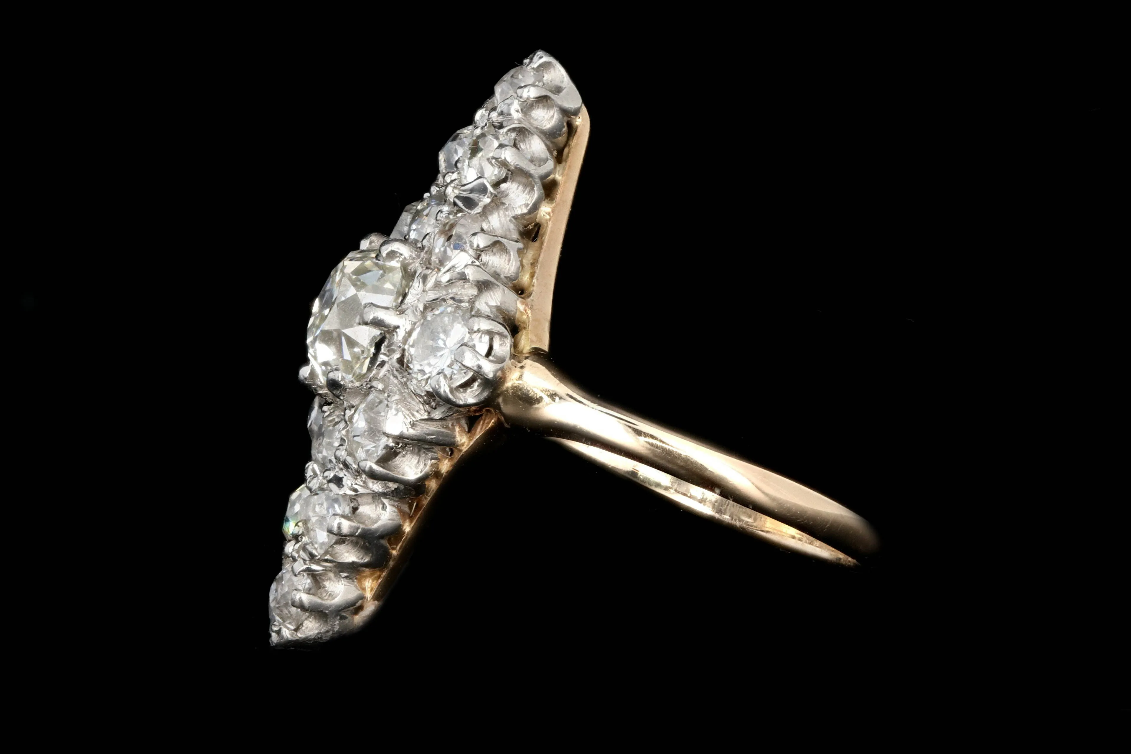 Victorian Platinum and 14K Yellow Gold .60 Carat Old Mine Cut Diamond Navette Ring