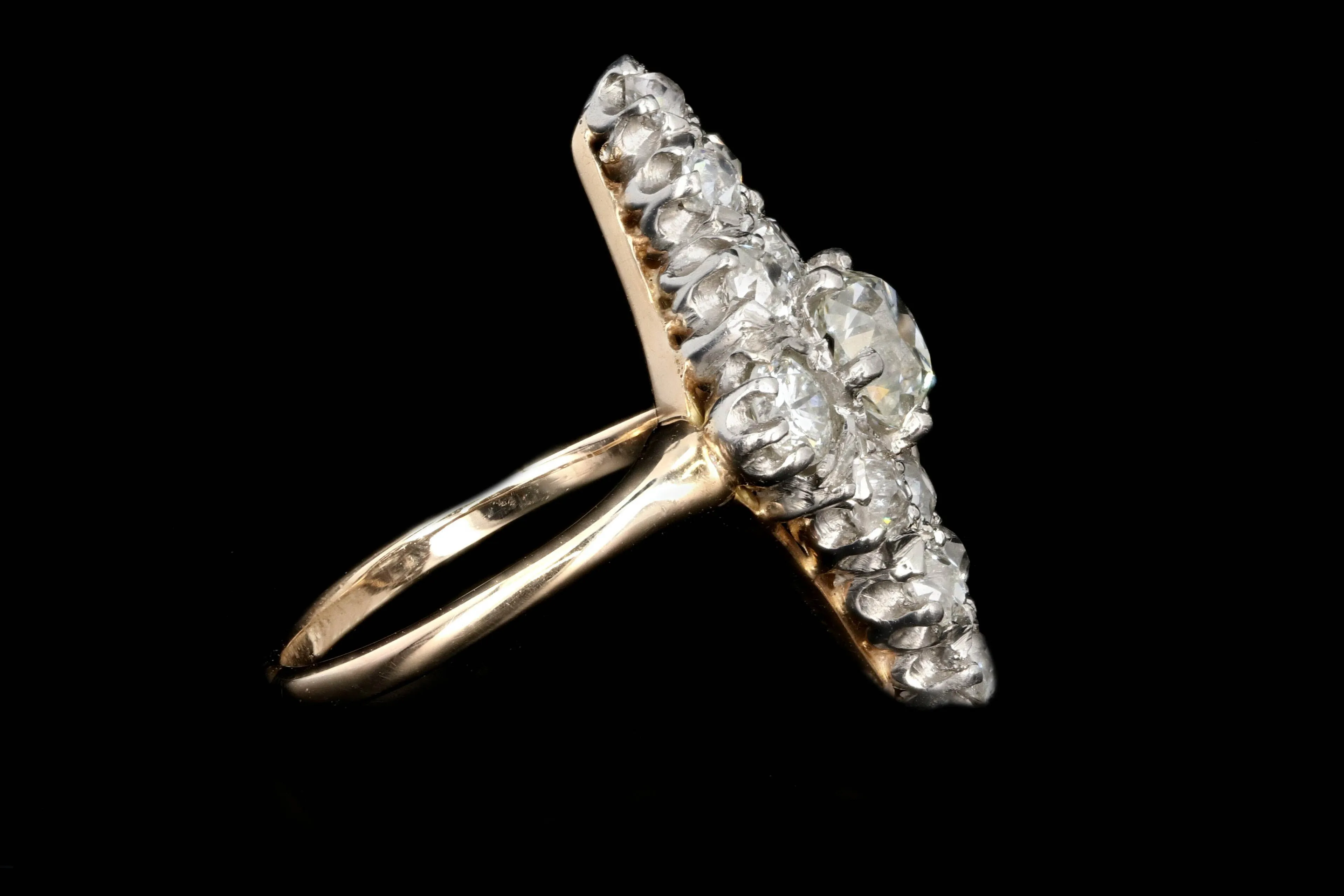 Victorian Platinum and 14K Yellow Gold .60 Carat Old Mine Cut Diamond Navette Ring
