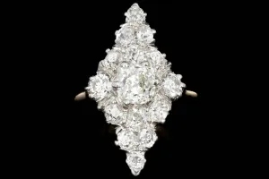 Victorian Platinum and 14K Yellow Gold .60 Carat Old Mine Cut Diamond Navette Ring