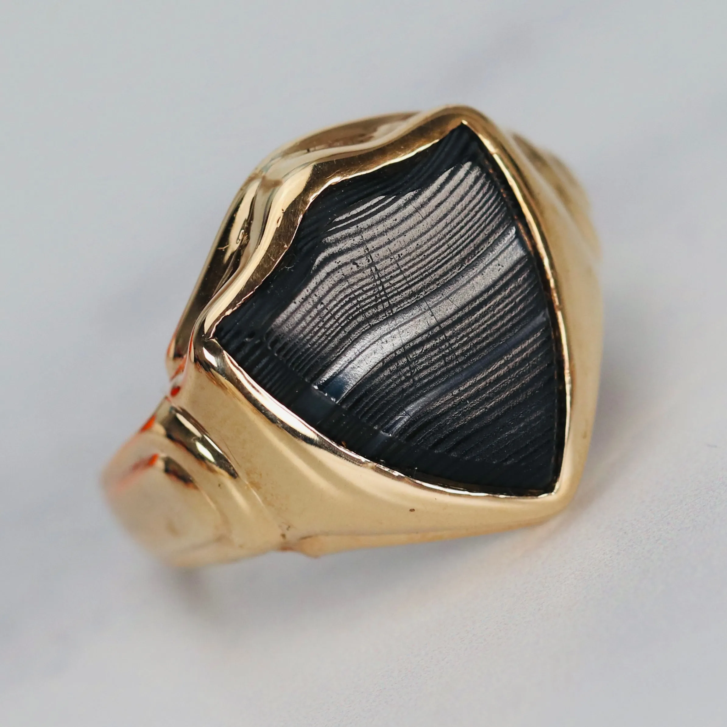 Vintage shield shaped banded agate (onyx family) ring in yellow gold