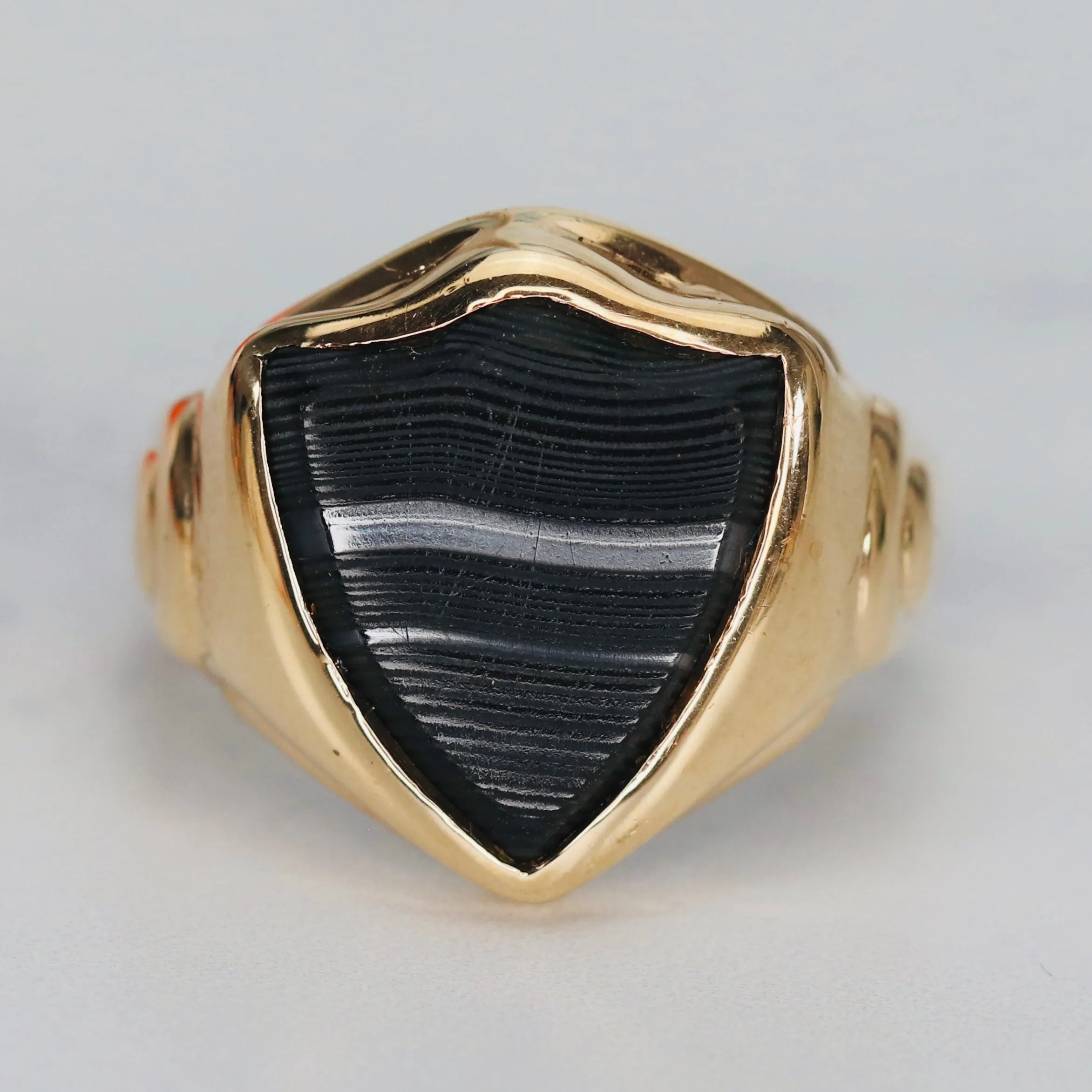 Vintage shield shaped banded agate (onyx family) ring in yellow gold