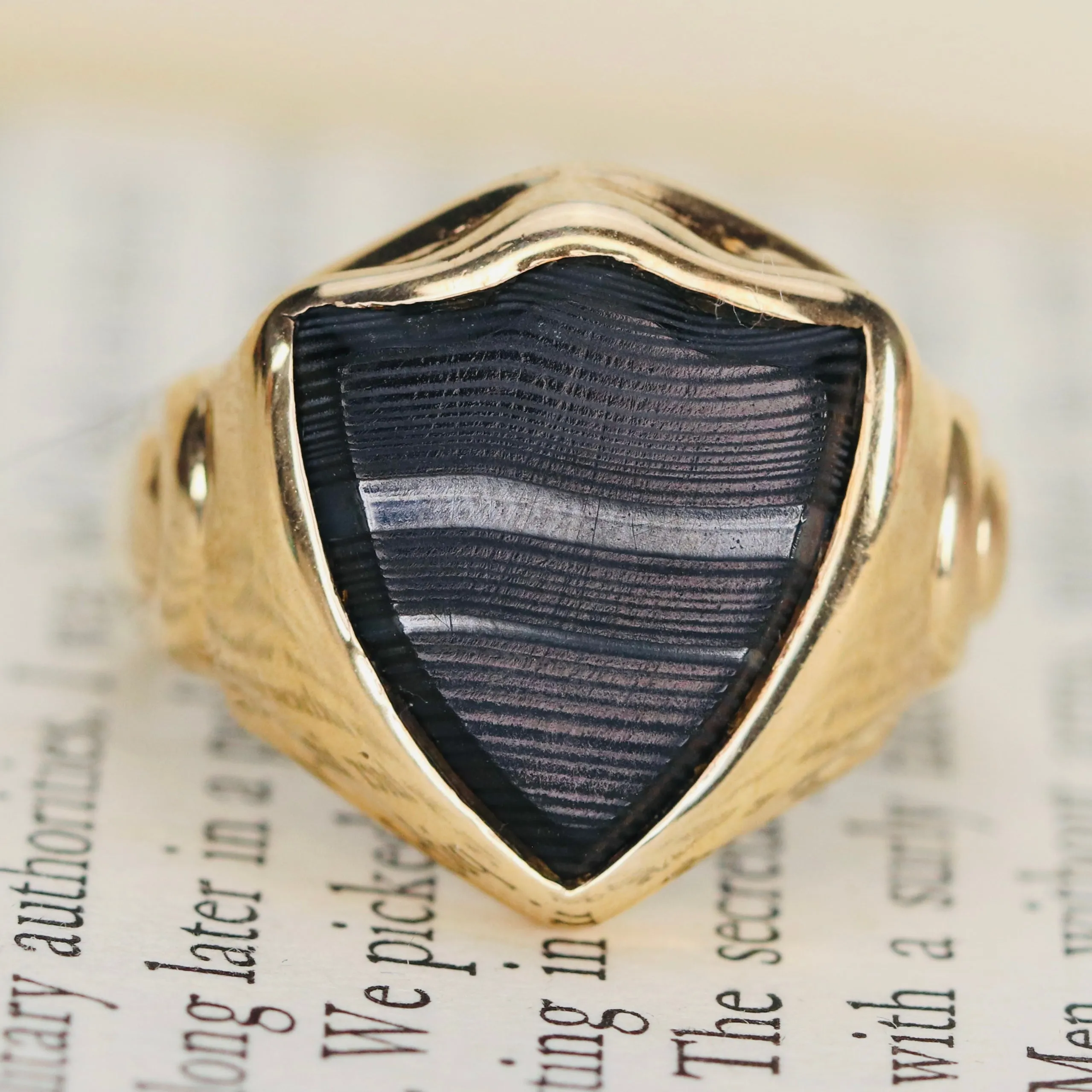 Vintage shield shaped banded agate (onyx family) ring in yellow gold