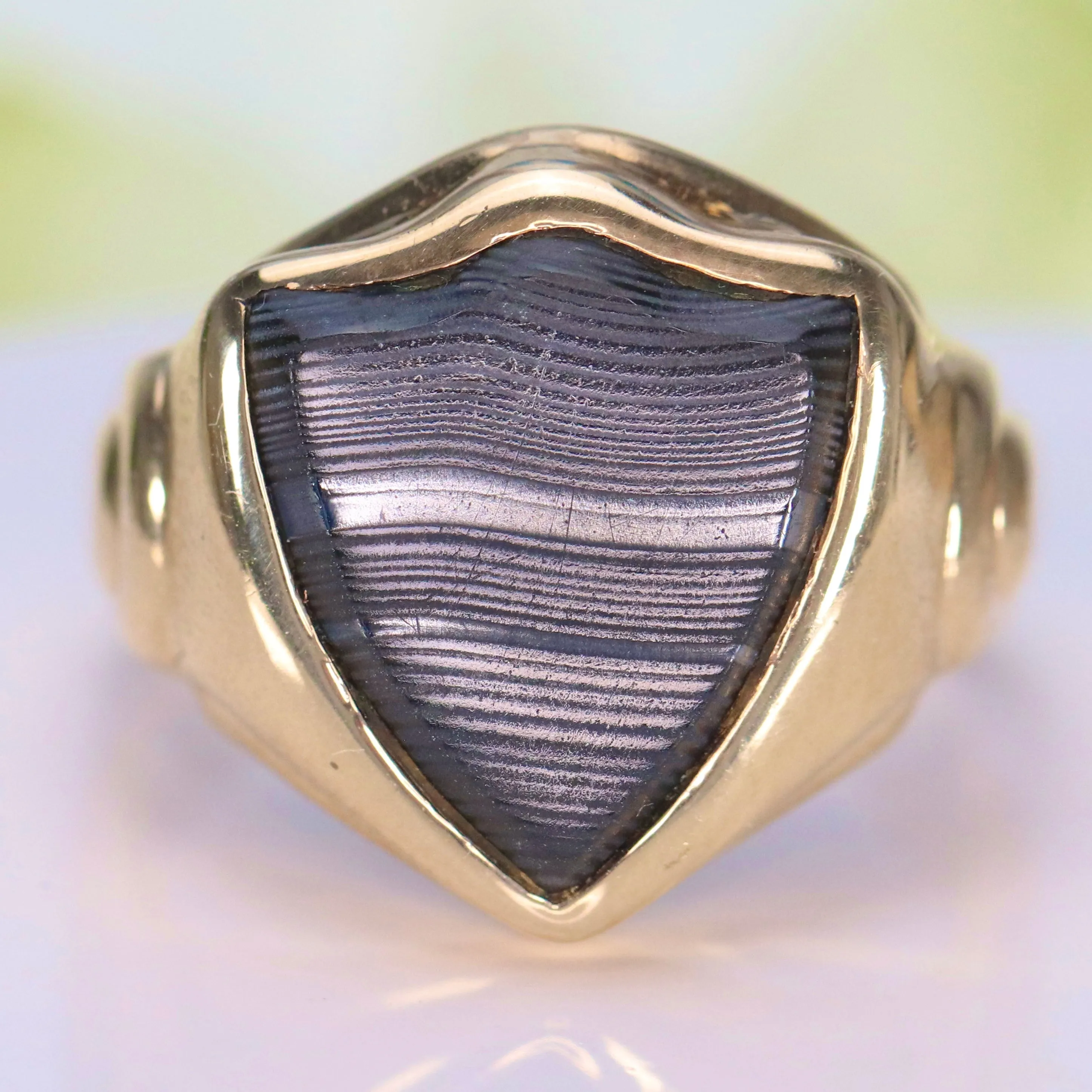 Vintage shield shaped banded agate (onyx family) ring in yellow gold