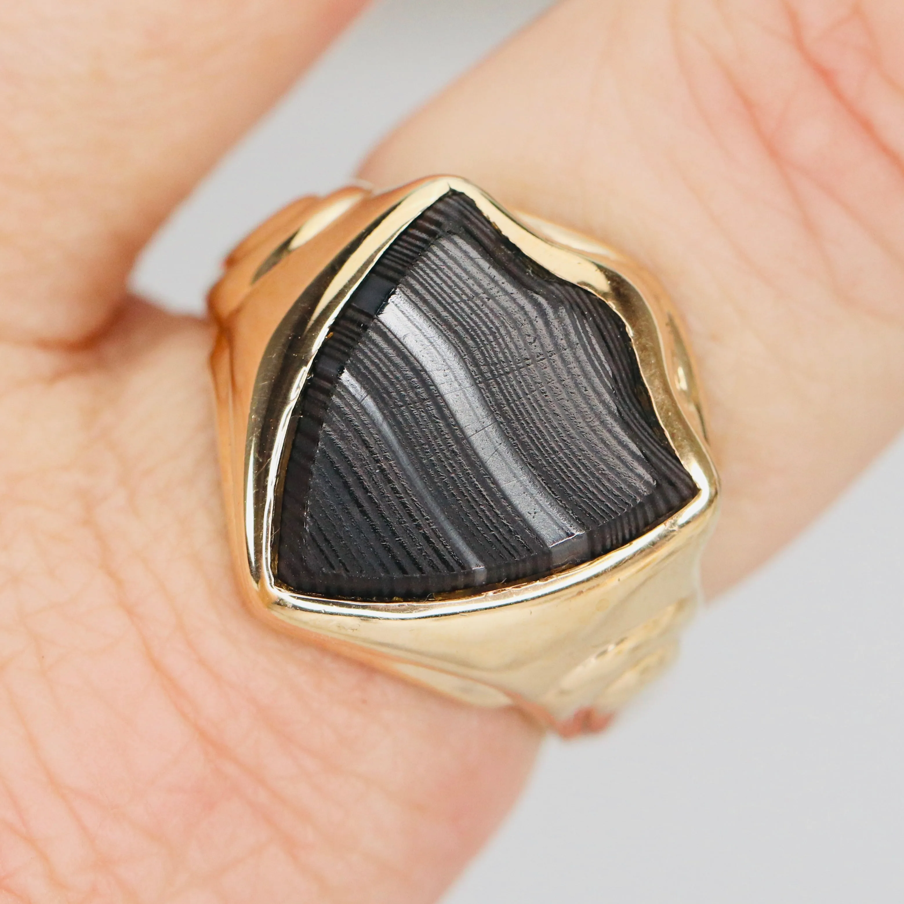 Vintage shield shaped banded agate (onyx family) ring in yellow gold